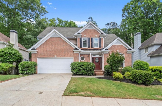 traditional home with brick siding, driveway, a front lawn, and a garage