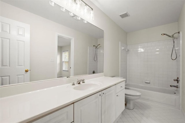 full bathroom with toilet, tile patterned floors, washtub / shower combination, and vanity