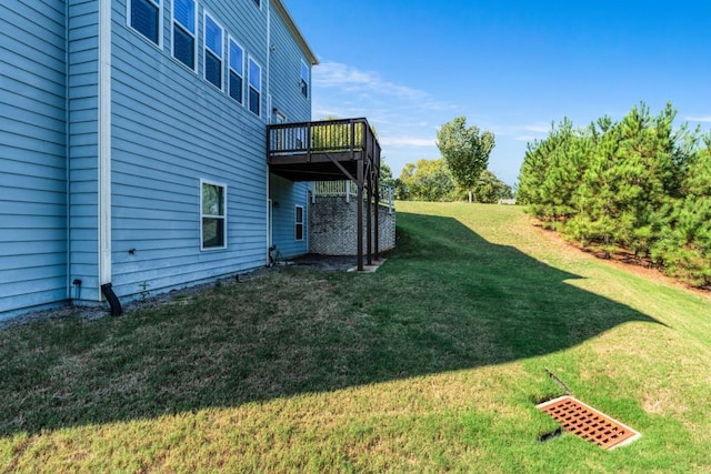 view of yard with a wooden deck