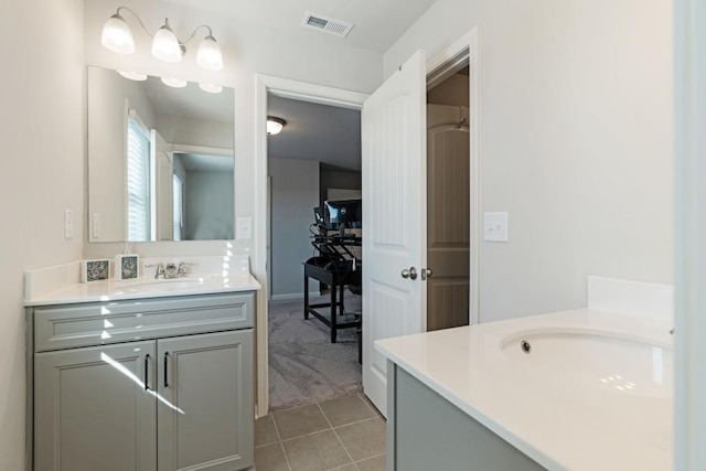 bathroom featuring vanity and tile patterned floors