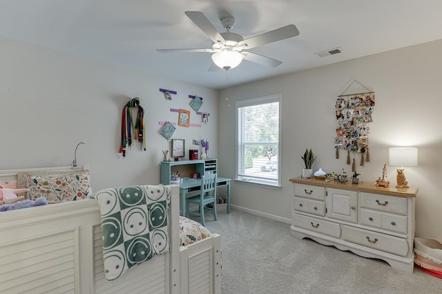 bedroom featuring baseboards, a ceiling fan, carpet flooring, and visible vents