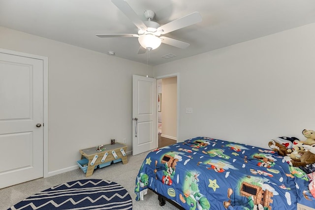 bedroom with visible vents, carpet flooring, baseboards, and a ceiling fan