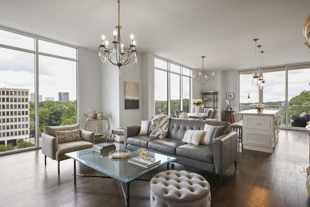 1820 Peachtree St Unit 614, Atlanta, GA 30309 - living area featuring floor to ceiling windows, a chandelier, plenty of natural light, and dark wood-type flooring
