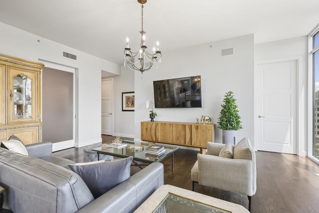 1820 Peachtree St Unit 614, Atlanta, GA 30309 - living area featuring a chandelier, wood finished floors, and baseboards