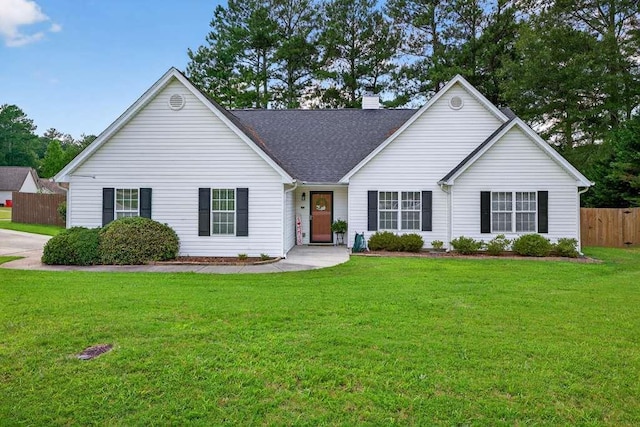 734 Evergreen Dr, Winder, GA 30680 - view of front of house featuring a chimney and roof with shingles