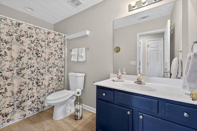 734 Evergreen Dr, Winder, GA 30680 - full bathroom with vanity, a shower with curtain, and wood finished floors