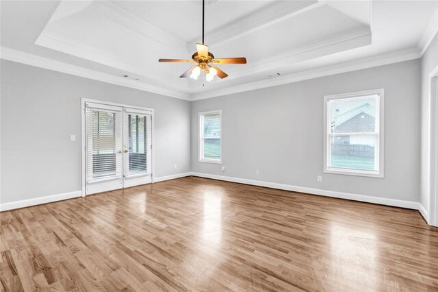 kitchen featuring pendant lighting, white cabinets, a center island, a kitchen breakfast bar, and backsplash