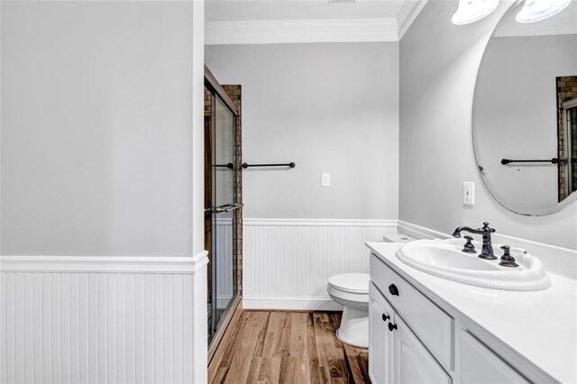 kitchen featuring white cabinetry, stainless steel appliances, tasteful backsplash, sink, and a center island with sink