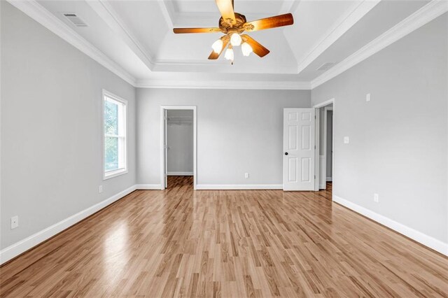 kitchen featuring decorative backsplash, white cabinetry, stainless steel fridge with ice dispenser, and crown molding