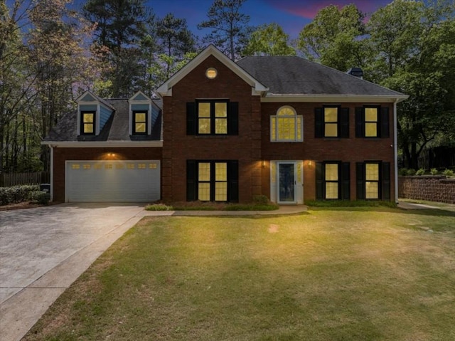 1960 Barnes Mill Rd, Marietta, GA 30062 - colonial-style house featuring concrete driveway, fence, and a lawn