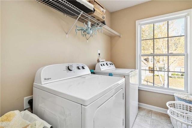 2319 White Alder Dr, Buford, GA 30519 - washroom with light tile patterned floors, separate washer and dryer, laundry area, and baseboards