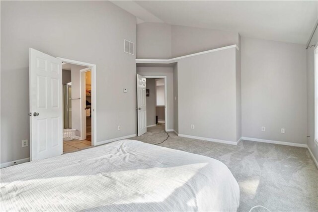 2319 White Alder Dr, Buford, GA 30519 - bedroom with light carpet, high vaulted ceiling, visible vents, and baseboards