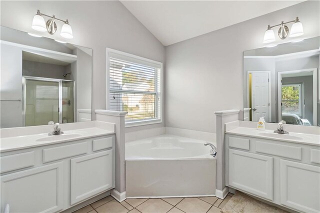 2319 White Alder Dr, Buford, GA 30519 - ensuite bathroom featuring a sink, vaulted ceiling, tile patterned flooring, and a stall shower