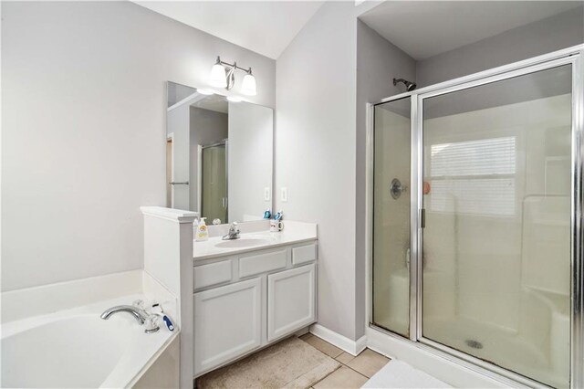 2319 White Alder Dr, Buford, GA 30519 - full bathroom featuring a shower stall, tile patterned flooring, vanity, and a bath