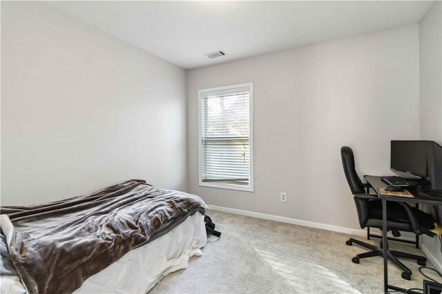 2319 White Alder Dr, Buford, GA 30519 - bedroom with carpet flooring, visible vents, and baseboards