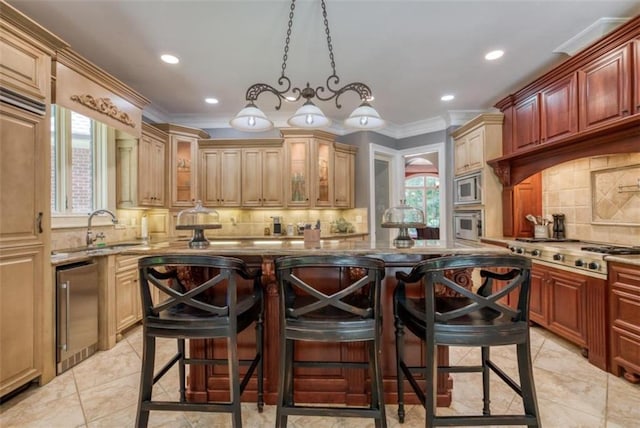 kitchen featuring light tile floors, a breakfast bar, tasteful backsplash, ornamental molding, and appliances with stainless steel finishes