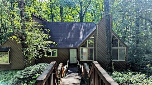 3246 Able Ct, Marietta, GA 30062 - view of front facade featuring a chimney and a forest view