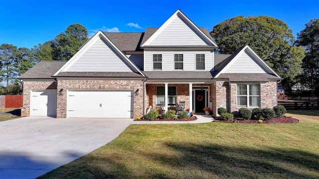 view of front facade featuring a garage and a front yard