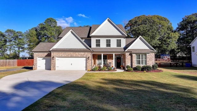 view of front of home featuring a garage and a front yard