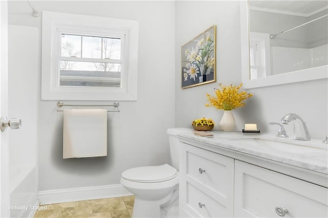 706 S Grand Ave NW, Atlanta, GA 30318 - bathroom featuring vanity, toilet, baseboards, a shower, and crown molding