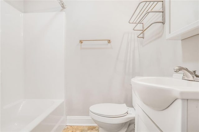 706 S Grand Ave NW, Atlanta, GA 30318 - full bathroom featuring vanity, baseboards, and toilet