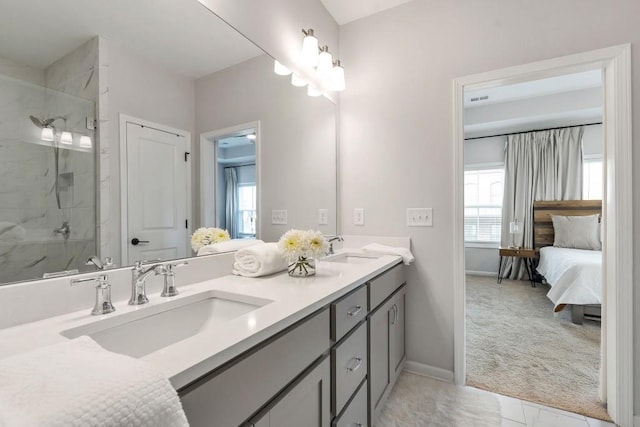 bathroom with vanity and an enclosed shower