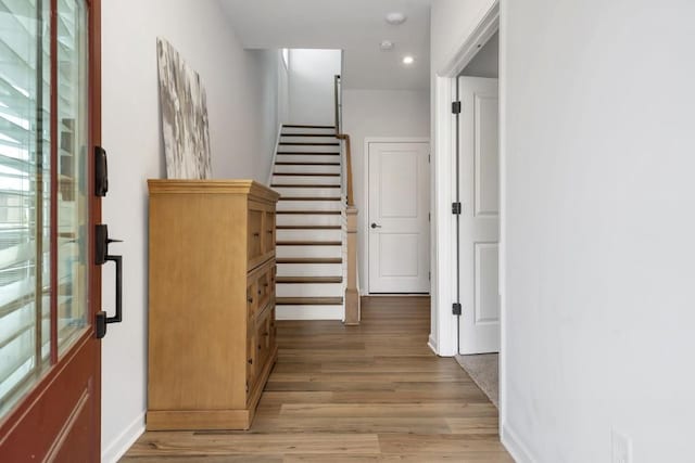 hall with light wood-type flooring