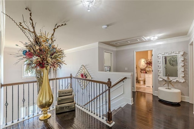 1405 Rainey Way, Hampton, GA 30228 - hallway with wood finished floors, an upstairs landing, and ornamental molding