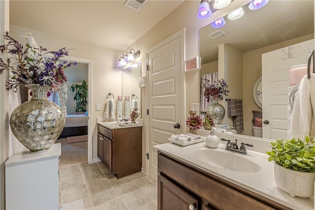 1405 Rainey Way, Hampton, GA 30228 - full bathroom with vanity, ensuite bath, and tile patterned floors