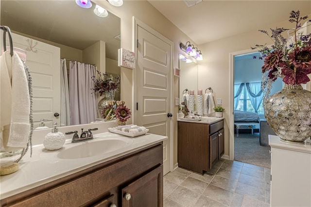 1405 Rainey Way, Hampton, GA 30228 - bathroom with vanity, tile patterned floors, and ensuite bathroom