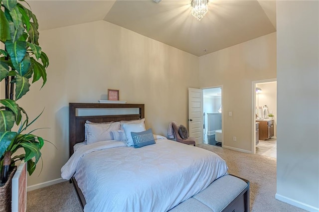 1405 Rainey Way, Hampton, GA 30228 - carpeted bedroom featuring lofted ceiling and connected bathroom