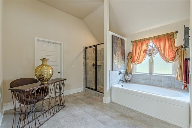 1405 Rainey Way, Hampton, GA 30228 - full bath featuring a garden tub, a shower stall, and vaulted ceiling