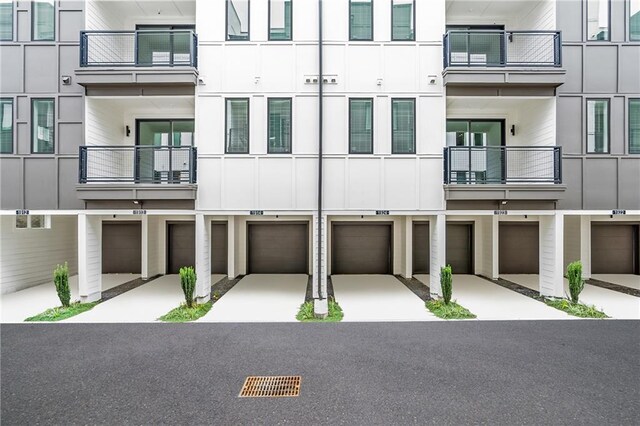 392 Pratt Dr Unit 2013, Atlanta, GA 30315 - view of building exterior with a garage and driveway