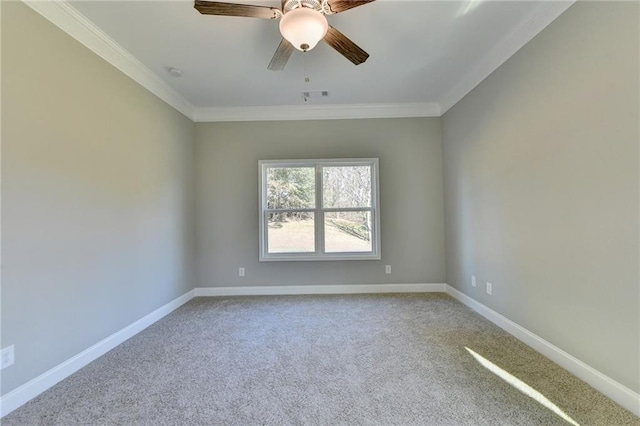 unfurnished room featuring carpet floors, crown molding, and ceiling fan