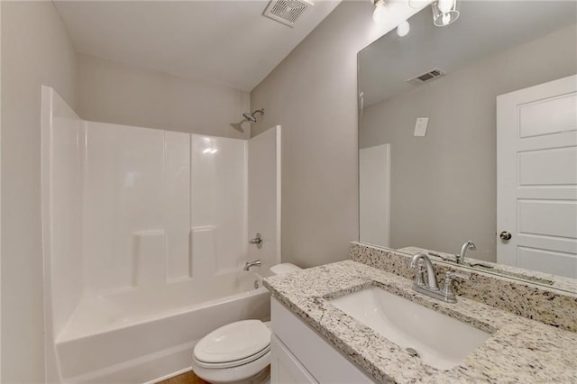 full bathroom featuring vanity, shower / bath combination, and toilet