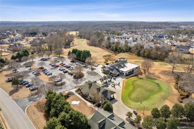 aerial view with view of golf course and a residential view