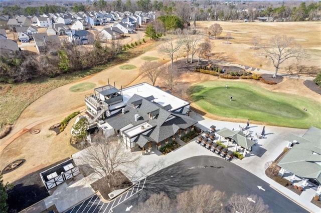 aerial view with a residential view and golf course view