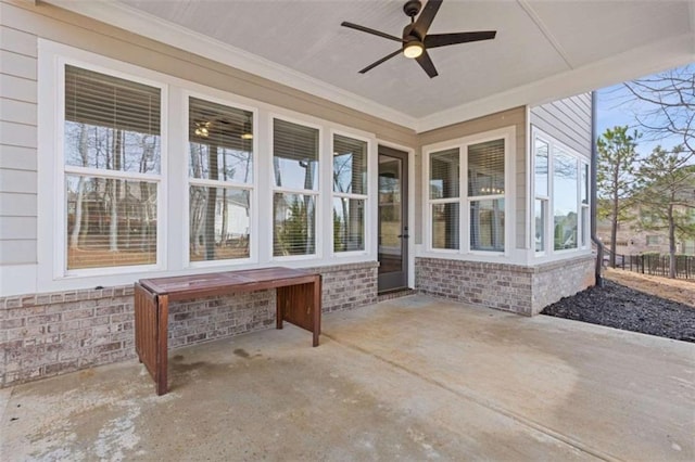 view of patio with a ceiling fan