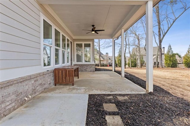 view of patio featuring ceiling fan