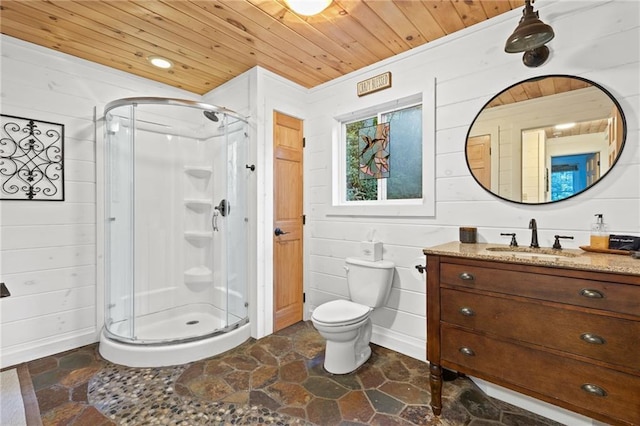 bathroom with toilet, a shower with shower door, wood ceiling, and vanity