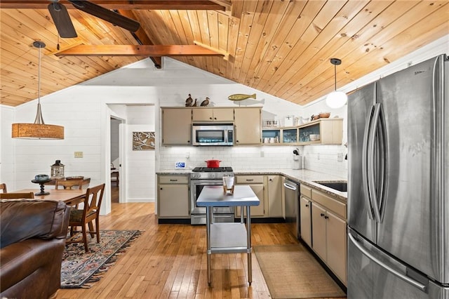 kitchen featuring wood ceiling, stainless steel appliances, light hardwood / wood-style floors, and vaulted ceiling with beams