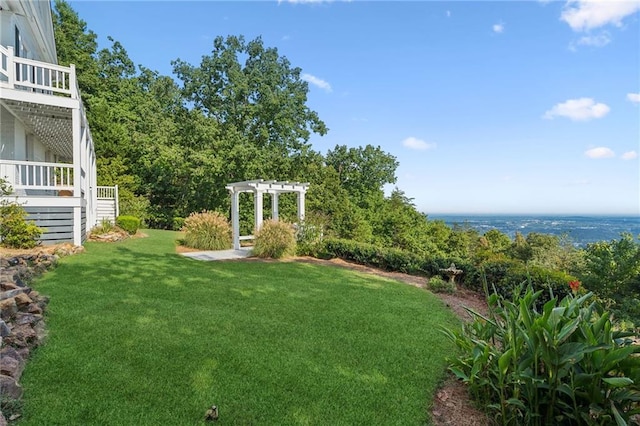 view of yard with a pergola