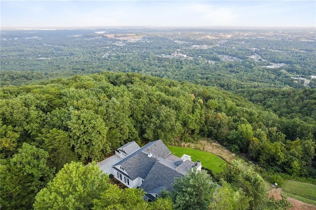 aerial view featuring a view of trees