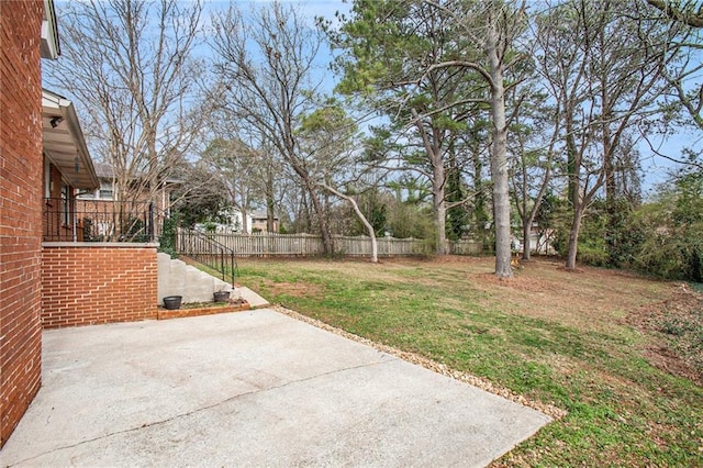 view of yard with fence private yard and a patio area