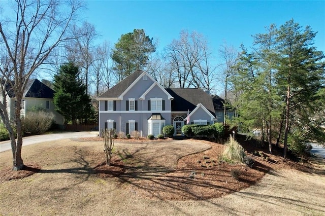 view of front of property with stucco siding and driveway