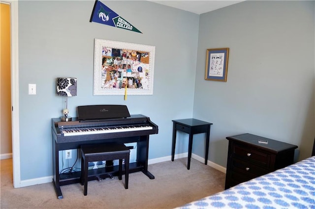 carpeted bedroom with baseboards