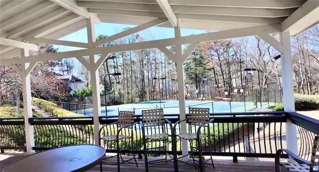 wooden deck featuring fence