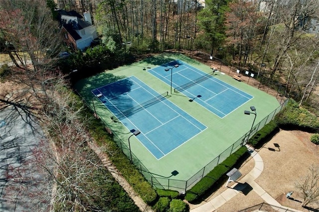 view of tennis court with fence