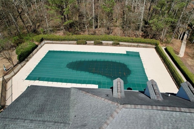 view of pool featuring a covered pool and a patio area