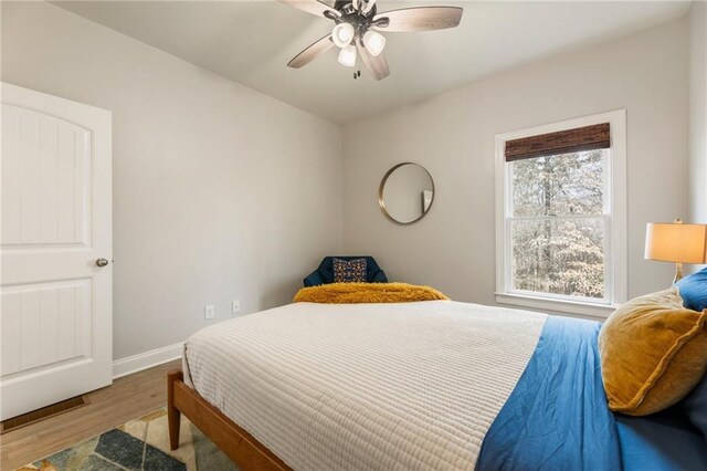 2660 Burnt Hickory Dr, Cumming, GA 30028 - bedroom featuring wood finished floors, baseboards, and ceiling fan